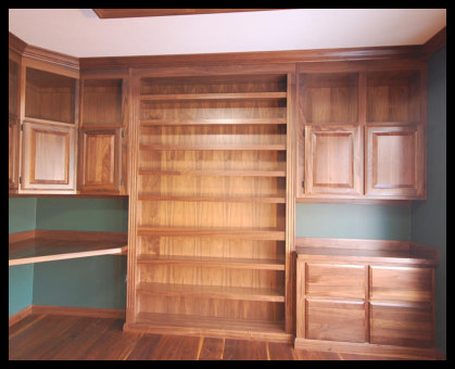 56-inch Wide Solid Walnut Bookcase with Reinforced Nosing, Fluted Moldings, and Raised Panel Drawer Bank - No Particle Board