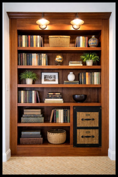 8ft tall custom Cherry wood built-in bookcase with wide fluted vertical moldings and 1.5-inch thick fluted shelving.