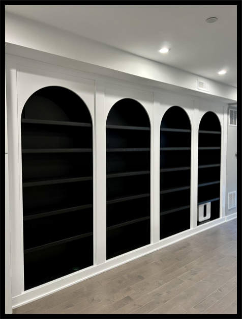 14ft wide by 8ft tall 4-tier custom bookcase system with arched half-circle diameter tops.